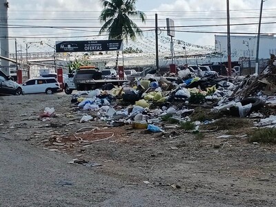 Comerciantes de Los Alcarrizos denuncian acumulación de basura